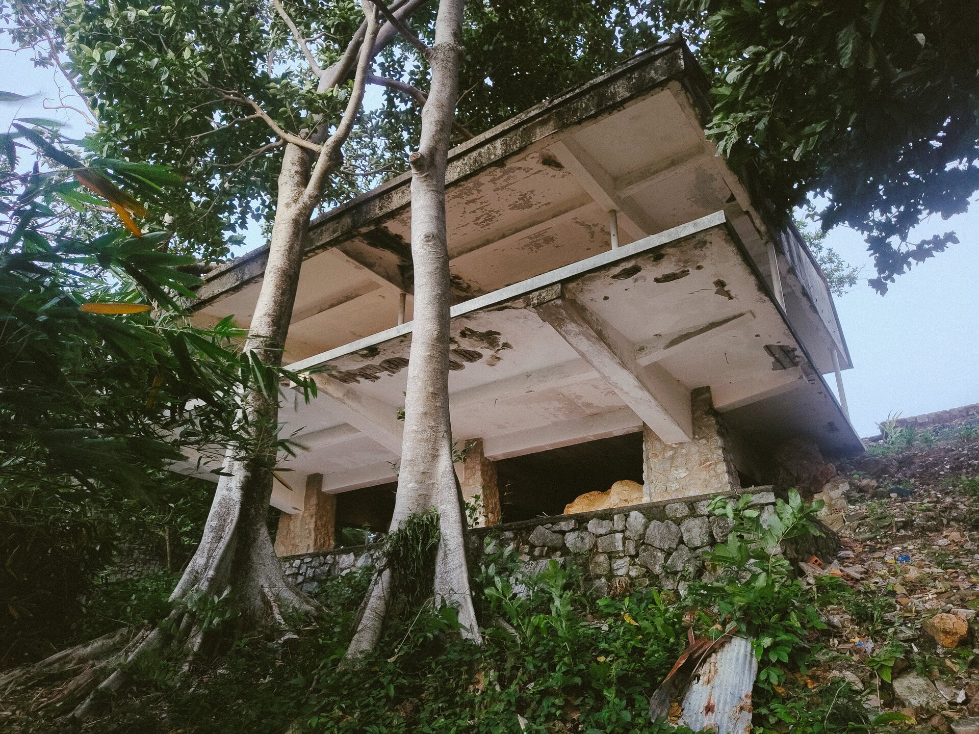 under cliffside building