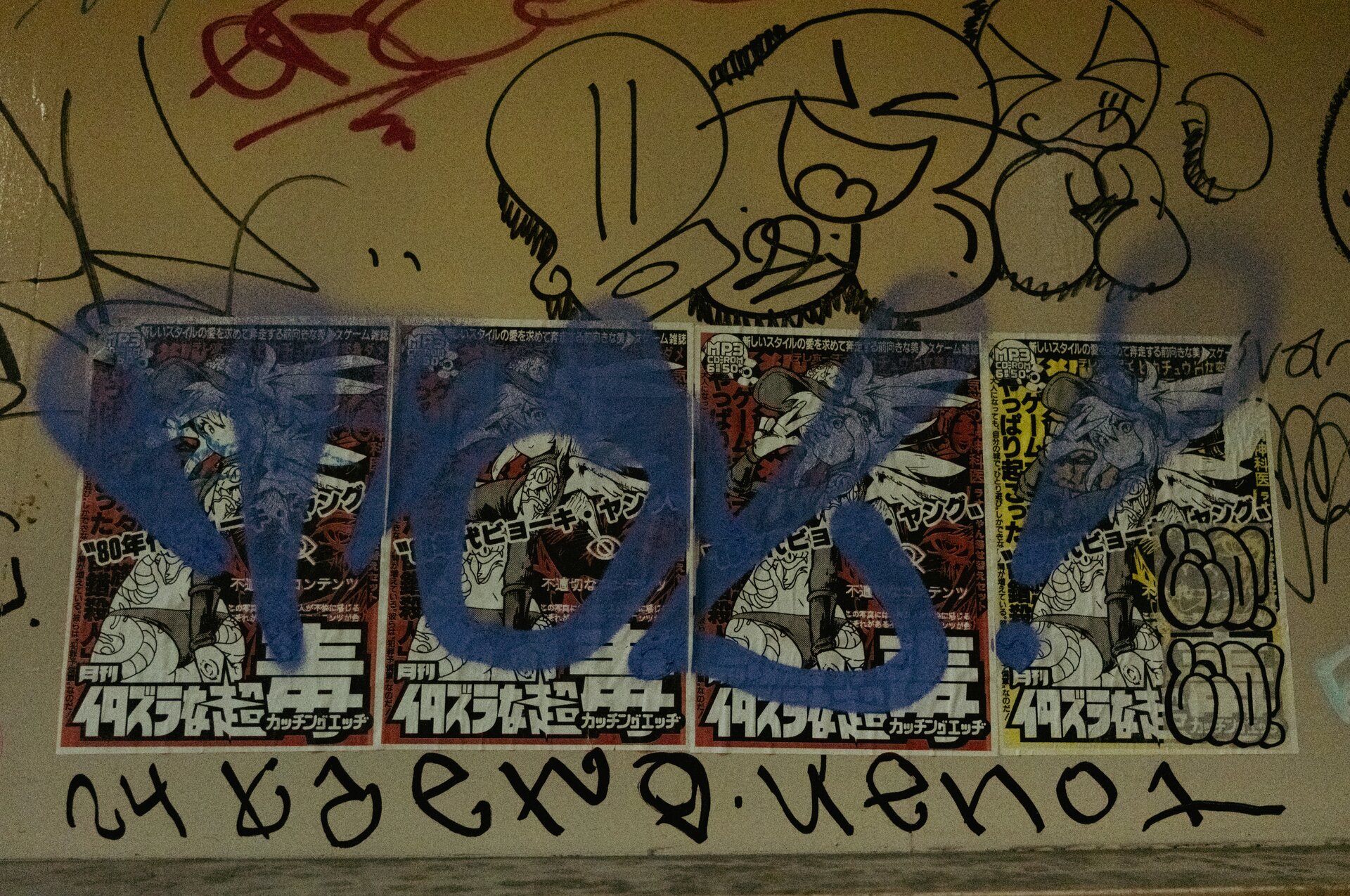 graffitied posters