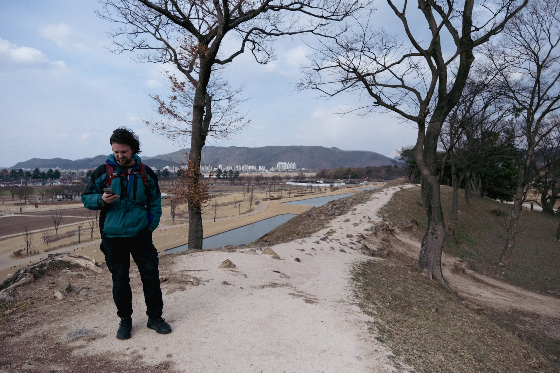 jade checking his phone